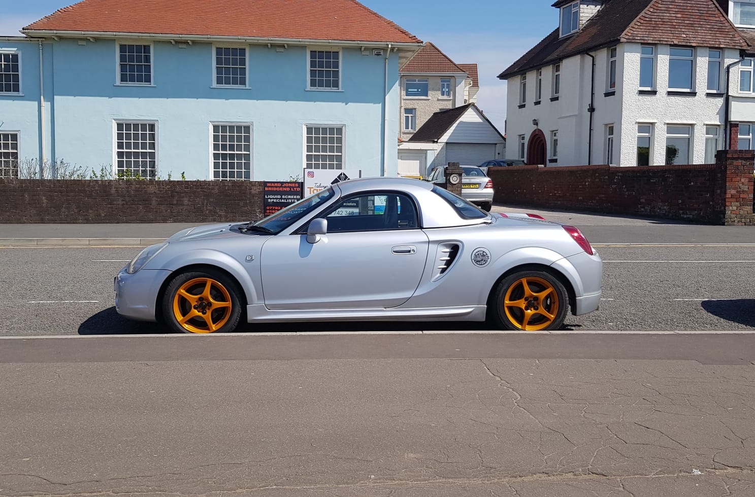 Silver MR2 MK3 with orange wheels